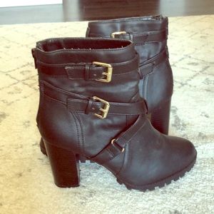 Black heeled combat boot